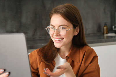 Young woman using mobile phone