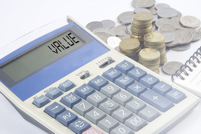 High angle view of coins on table