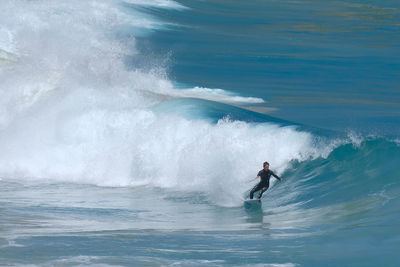 Man surfing in sea