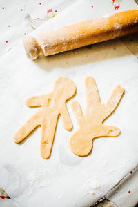 Close-up of gingerbread men dough