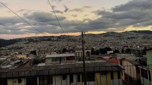 Cityscape against sky during sunset