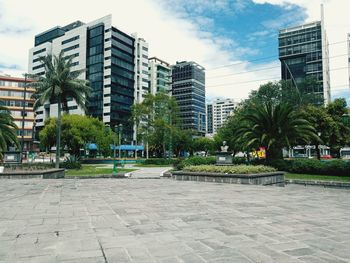 View of city buildings against sky