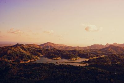 Scenic view of landscape against sky during sunset