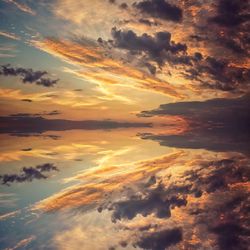 Low angle view of clouds in sky during sunset