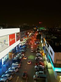 High angle view of traffic on city street at night