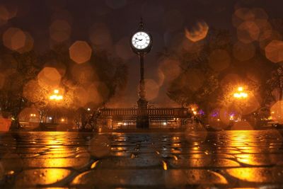 Illuminated street light at night