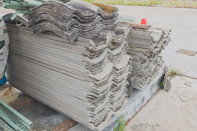 High angle view of stack on table against wall