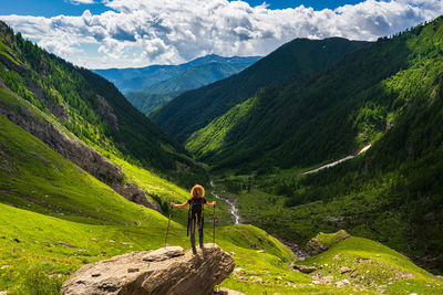 Man looking at mountains