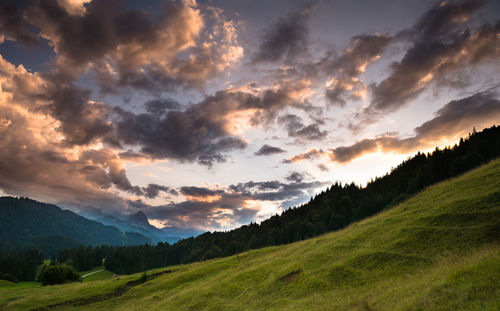 Scenic view of landscape against sky during sunset