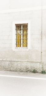 White window on wall of building