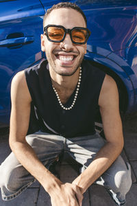 Portrait of young man wearing sunglasses