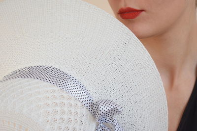 Close-up of woman wearing hat