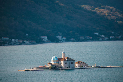 Scenic view of sea against mountain