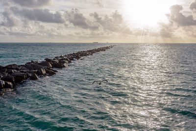 Sun shining over sea