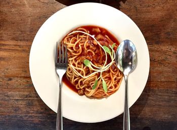 Directly above shot of noodles served on table