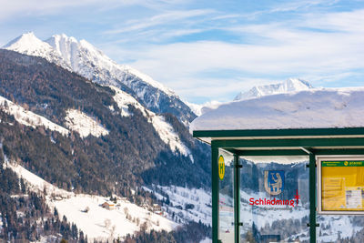 Panoramic view of snowcapped mountains against sky