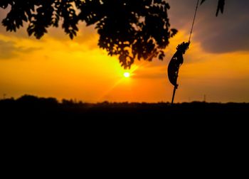 Silhouette tree against sky during sunset