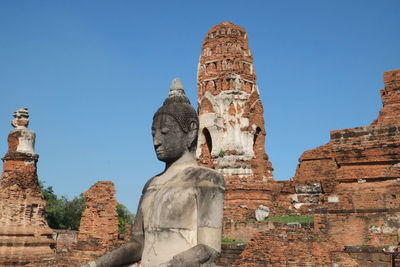 Statue of temple against clear sky