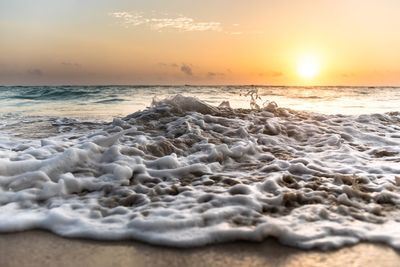 Scenic view of beach during sunset