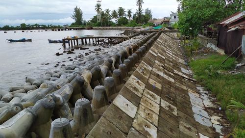 Panoramic shot of bridge over sea against sky