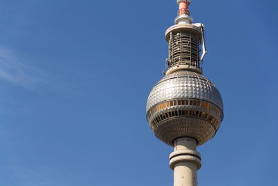 Low angle view of building against blue sky