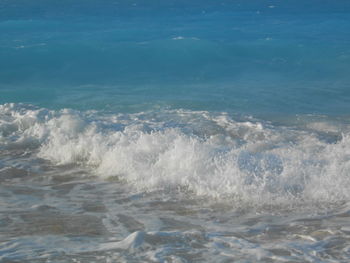 Scenic view of sea against blue sky