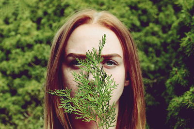 Close-up portrait of young woman