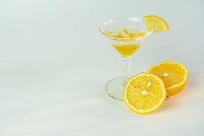 Drink on glass against white background