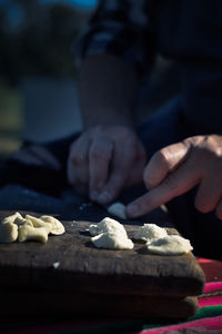 Close-up of person preparing food