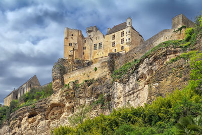 Low angle view of old ruins against sky