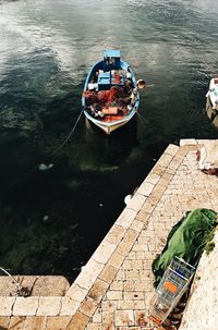 High angle view of boat moored in water