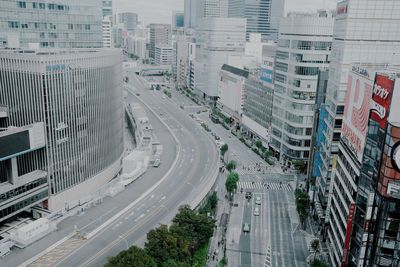 High angle view of road amidst buildings in city