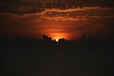 Scenic view of silhouette landscape against sky during sunset