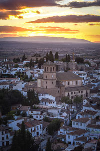 High angle view of townscape against sky at sunset