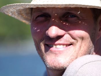 Close-up portrait of a smiling young man