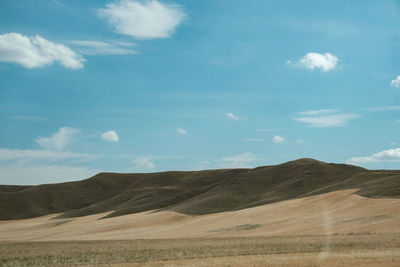 View of mountain and wheat fields