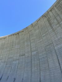 Low angle view of building against blue sky