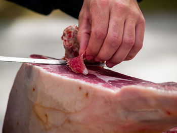 Close-up of person preparing food