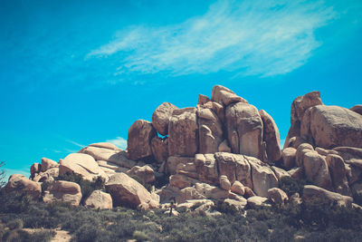 Rock formations against blue sky