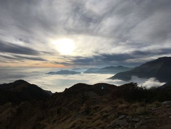 Scenic view of mountains against sky during sunset