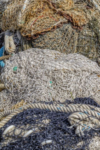 Close-up of fishing net at harbor