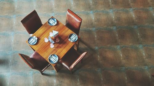 High angle view of place setting on wooden table