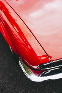 High angle view of red car on road