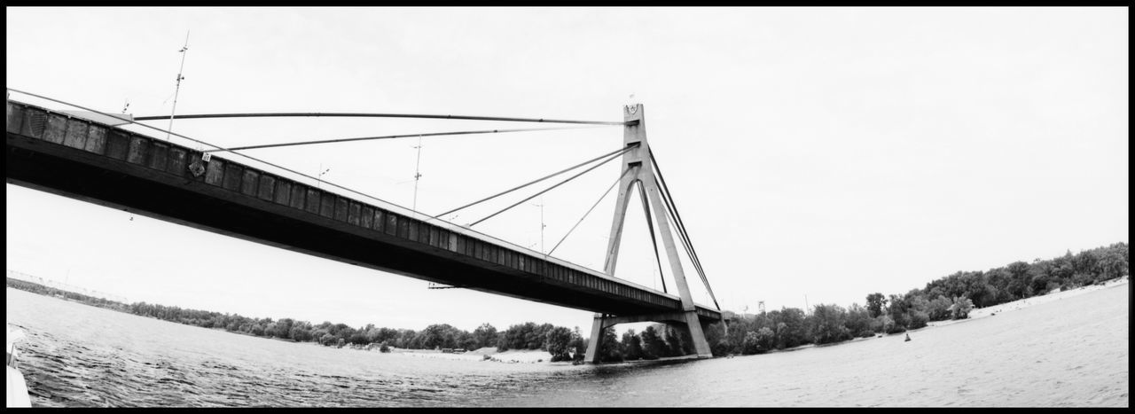 BRIDGE OVER RIVER AGAINST SKY