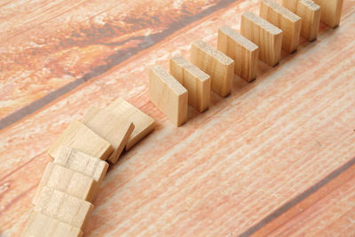 High angle view of toy blocks arranged on wooden table