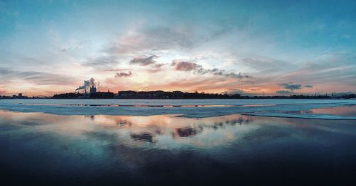 Scenic view of sea against sky during sunset