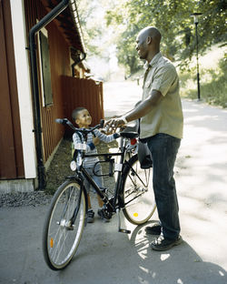 Father with son on bike