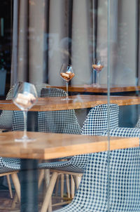 Empty chairs and tables in cafe