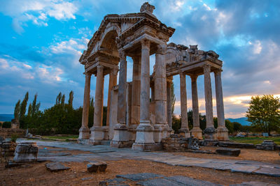 Low angle view of old temple against sky