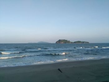 Scenic view of sea against clear sky